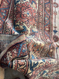 Vintage Persian Sultanabad carpet with intricate floral drawing and rich vegetable-dyed colors.