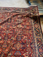 Hand-knotted details visible in Mahal rug texture.
