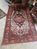 Antique Persian area rug 4'5 x 6'10 for living room, office, or entryway.