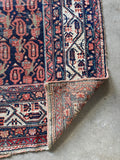 Vintage Persian scatter rug with vegetable dyed wool, tribal paisley design and authentic old-world charm.