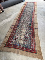 Outer camel hair border with floral motifs on a Seraband runner.