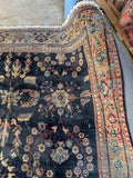 Village Persian Mahal rug with wheat colored border and floral motifs.