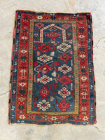 Small antique prayer rug