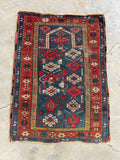 Small antique prayer rug