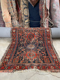 Small vintage Persian Heriz rug