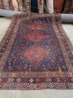 Large antique Persian rug