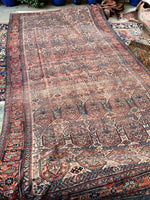 Large Persian antique rug