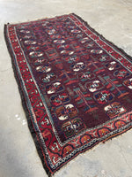 Small antique Persian rug