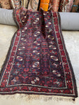 Small antique Persian rug