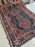 Antique Persian tribal rug