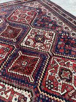 Large tribal Persian rug