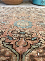 worn vintage rug
