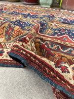 worn persian rug