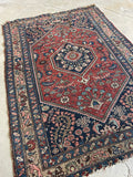 small vintage Persian rug